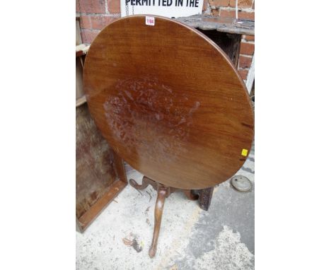A George III mahogany circular tilt-top tripod table, 75cm diameter. 