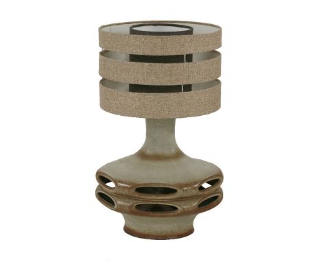 A West German pierced pottery hexagonal lamp base,1960s, with a double linen shade, marked 'Stein Keramik, W. Germany',60cm h