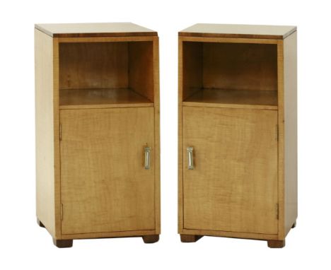 A pair of Art Deco sycamore and walnut pot cupboards,each with a shelf above a cupboard, on block feet,35.5cm wide35.5cm deep