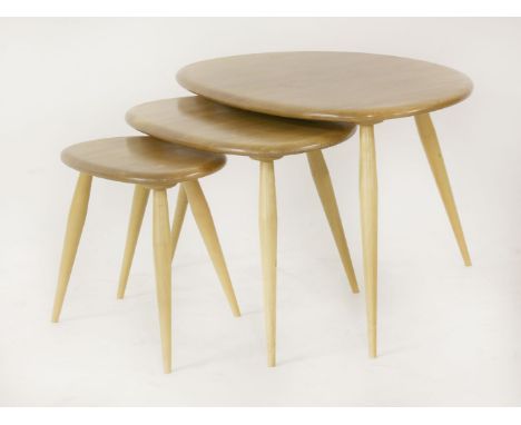 A nest of Ercol 'Pebble' tables,largest 66cm wide