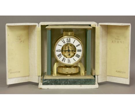 A gilt metal and green marble Jaeger LeCoultre Atmos Clock, c.1965,23.5cm high, in original fitted case