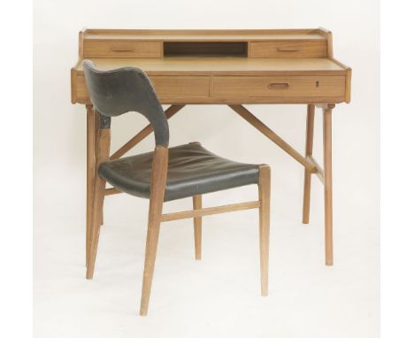 A Danish teak writing desk,designed by Arne Wahl Iversen, No. 641, with a raised shelf and two drawers over two further drawe