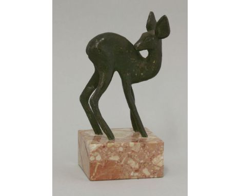 An Art Deco bronze,a fawn taking its first steps, looking back on itself, indistinctly signed, on a marble base, 17.2cm