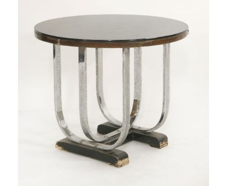 An Art Deco lamp table,the black glass top on a chrome 'U' shaped stand with an ebonised 'H' plinth,60.5cm diameter