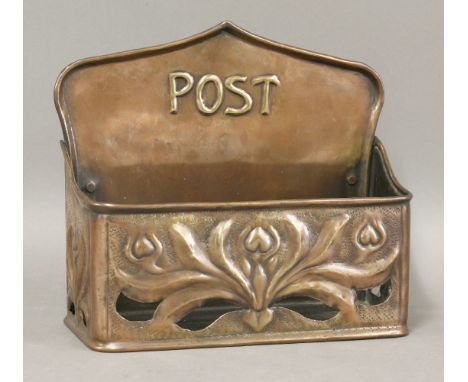 An Arts and Crafts copper embossed post trough,stamped 'RSIA',22cm wide