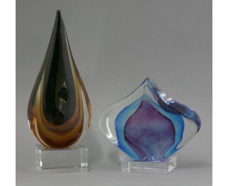Two Italian studio glass freeform sculptures,one of teardrop form with amethyst encased in amber, the other biomorphic in blu