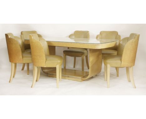 An Art Deco bird's-eye maple and walnut dining room suite,probably by Epstein, comprising:a dining table,the rectangular top 