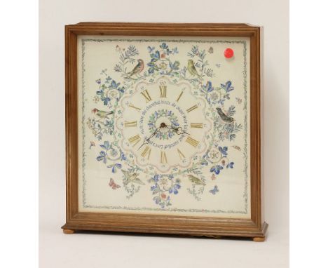 An electric walnut mantel clock, with the dial with gilt Roman numerals and painted with birds amongst foliage by D Hutton, t