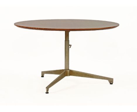 A rosewood circular dining table,1960s, raised on a rise and fall tripod stand,110.5cm diameter