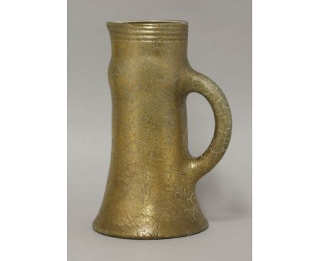 An Elton 'Sunflower' pottery jug,with a crackled gold glaze, the rim with horizontal bands, painted 'Elton' mark,22cm high