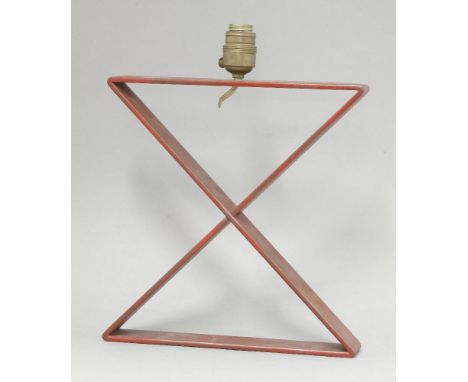 A X-form lamp base,after a design by Jean-Michel Frank (1895-1941), red painted iron,30.5cm high to top of stand