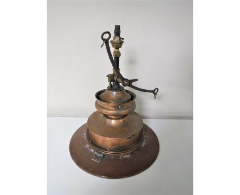 An antique copper ship's gas light