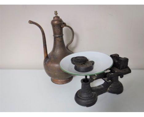 A set of vintage scales with weights together with an Eastern copper teapot