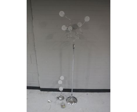 A Next chrome standard lamp with wire ball shade, together with matching table lamp 