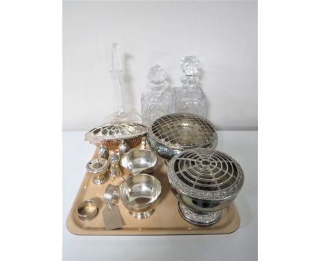 A tray containing two lead crystal whiskey decanters with stoppers with one other, plated rose bowls, cruet set, part plated 