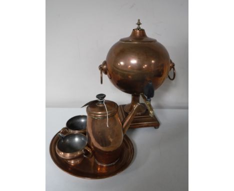 A 20th century copper samovar together with a copper serving tray, coffee pot, milk jug and sugar basin