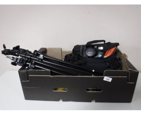 A box containing assorted camera equipment including tripods, camera bag, Pentax digital camera, flash, together with a Intaf