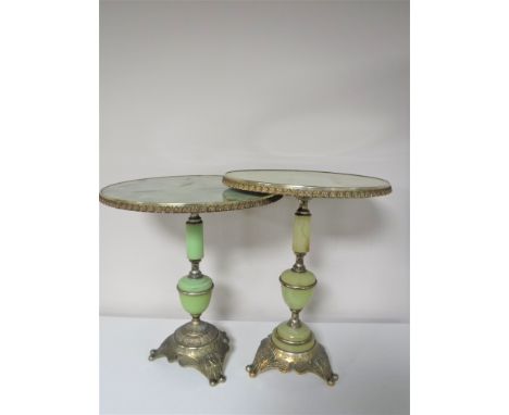 A pair of brass and onyx effect lamp tables