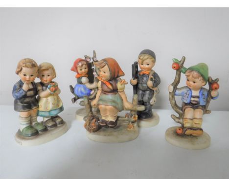 Five Goebel figurines including Chimney Sweep, Appletree Boy etc