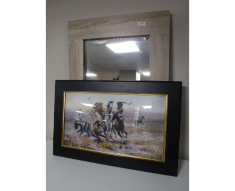 A contemporary Next framed mirror together with a G. M. Russell framed print depicting Native Americans