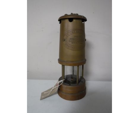 A miner's lamp for the British Coal Mining Company, Wales, Aberman Colliery, serial number 40219, height 23 cm.
