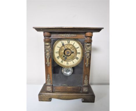 A pine cased American mantel clock