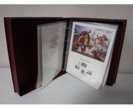 A folder containing limited edition first day lithographic covers