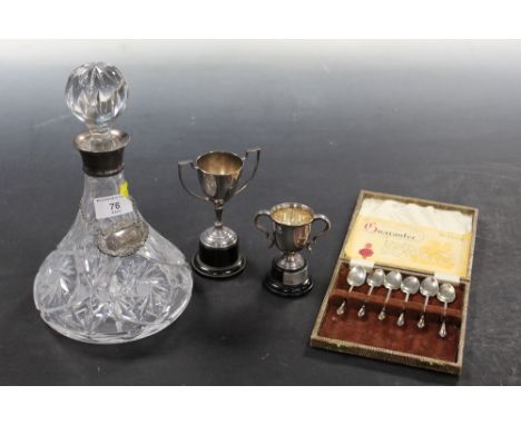 A HALLMARKED SILVER COLLARED DECANTER WITH SILVER SHERRY LABEL TOGETHER WITH TWO SILVER PLATED TROPHIES AND A CASED SET OF HA