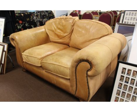 A TWO SEATER SOFA