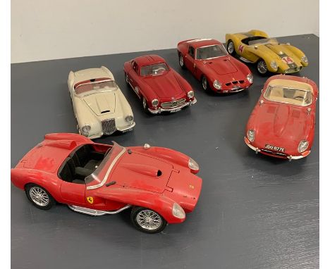 Six vintage Diecast sports cars by Burago including Ferrari, Jaguar and Mercedes 