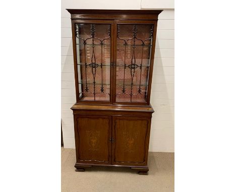 A mahogany inlaid library bookcase on bracket feet (H211cm W107cm D44cm)