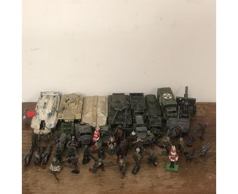 A selection of Diecast army vehicles and figures 