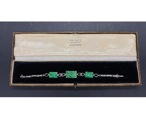 A Jade and 9 ct white gold bracelet