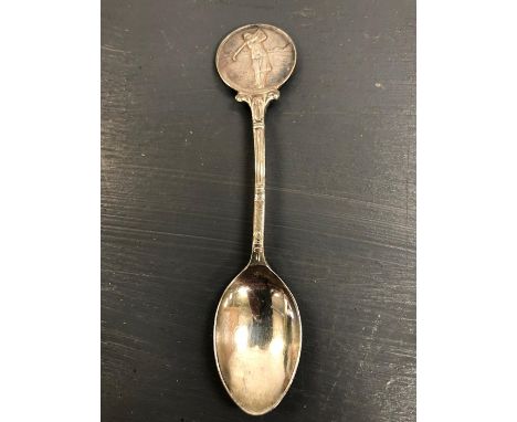 A Hallmarked silver golf themed spoon.