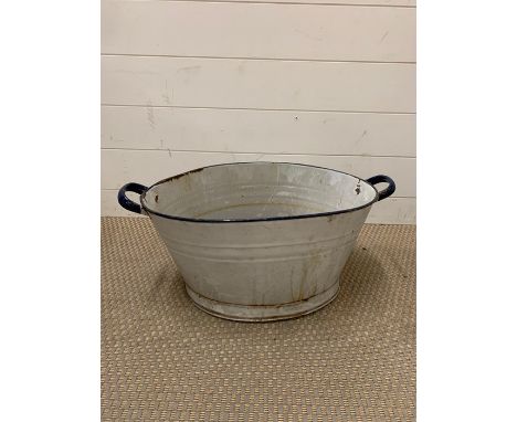 An enamel washing basin 
