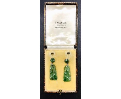 A pair of Jade earrings on 9 ct white gold settings