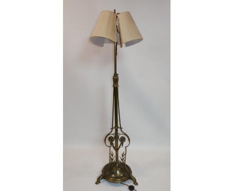 A Victorian brass adjustable oil standard lamp, converted to electricity 