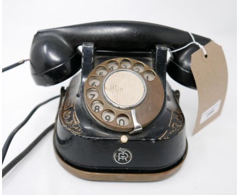 A Vintage RTT Anvers Belgique Bell Kettle Telephone MFG Company circa 1950s, black, with white dial folding brass carrying ha