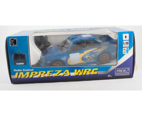 Remote control model boats, Lifeboat, Impreza WRC car, 2c Heli Master and Mini Boat quick charge, boxed, (4). 