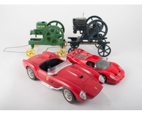 Six model Burago cars and two Ertl die-cast models of agricultural stationary engines. (one box full).