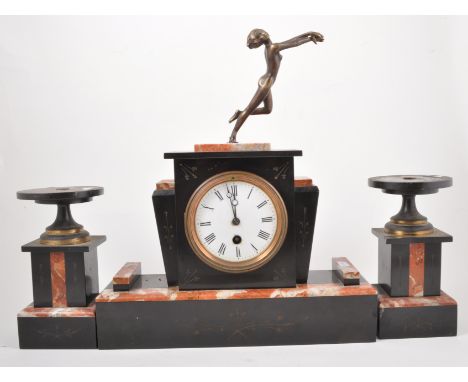 Art Deco marble mantel clock and garniture set, the clock mounted with a spelter figure of a dancing girl, lacking key and pe