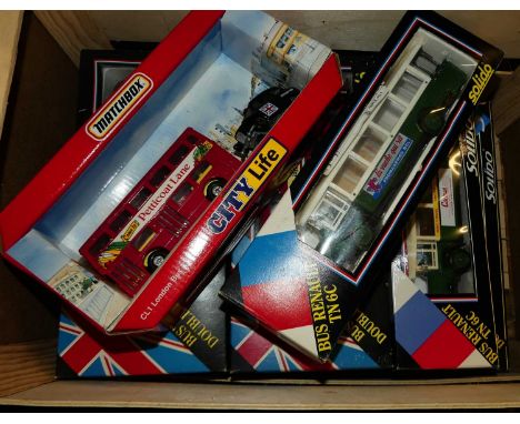 One small box of 7 boxed Solido buses (some boxes worn) and 1 Matchbox Bus set.