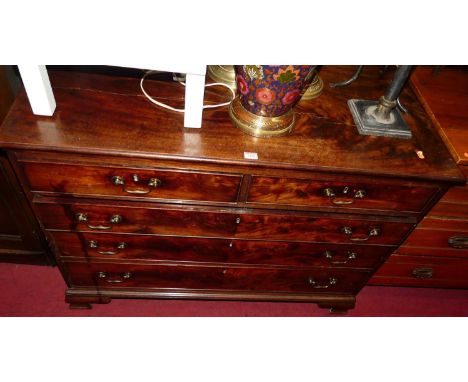 A George III mahogany chest, of two short over three long graduated drawers, on ogee bracket supports, w.114cm