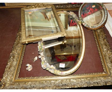 A gilt composition framed and floral mounted easel dressing table mirror, 37 x 24cm; two other larger examples; a stool and a