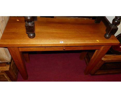 A contemporary light oak single drawer side table, w.120cm