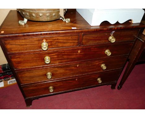 A Regency mahogany and cross banded chest of two short over three long graduated drawers, on splayed bracket supports, width 