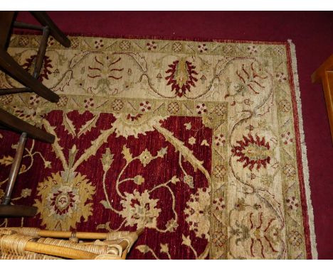 A large hand made Pakistani Farhan 100% new wool rug, 360 x 277 cm (with some wear and losses to surface particularly at one 