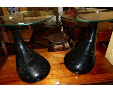 A pair of contemporary circular glass topped and polypropylene based lamp tables, dia.45cm