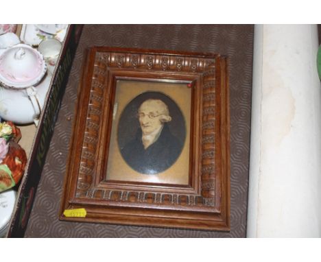 An oil portrait of a bespectacled gentleman