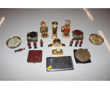A box containing Hummel figures, ink wells, paperweight, desk clocks etc.